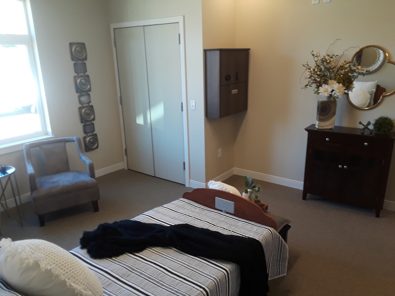 Long Term Skilled Nursing Care Facility Unit Room with Mirror