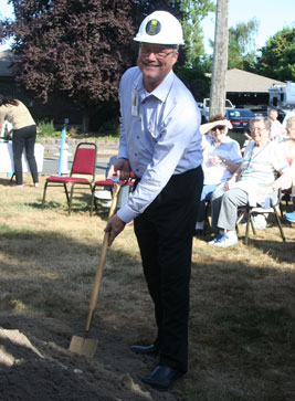 breaking ground at construction site