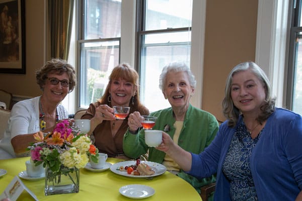 four women having lunch together