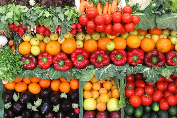 closeup of farmers market fruits and veggies