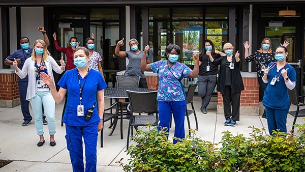 group of nurses following social distance guidelines