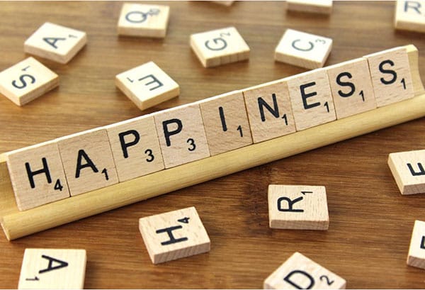 Happiness spelled using Scrable tiles