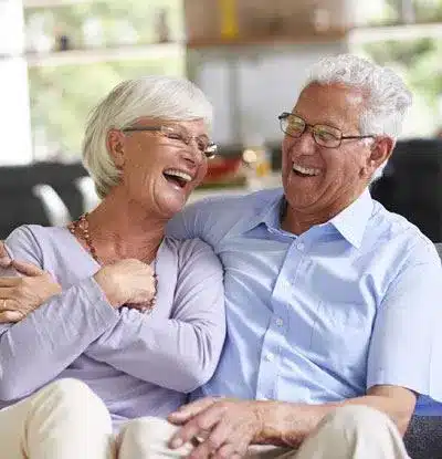 Two Seniors Laughing and Smiling