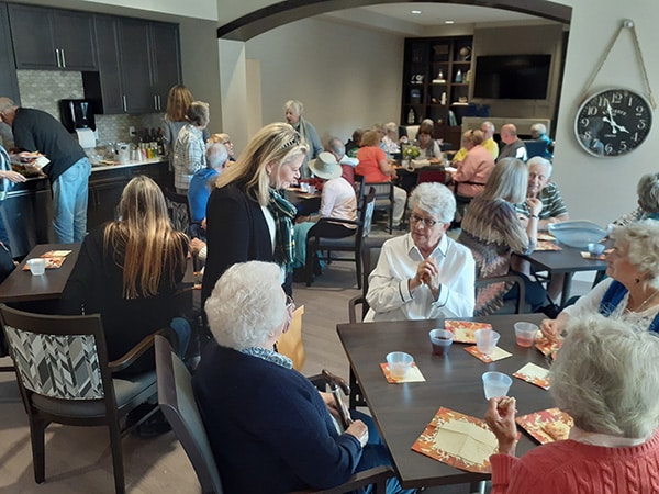 group of residents enoying refreshments