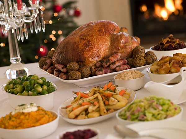 table full of Thanksgiving dinner dishes