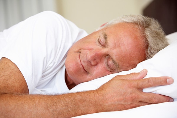 close-up of senior man sleeping