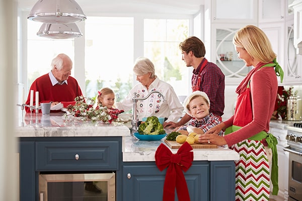 multi-generational family cooking a holiday meal