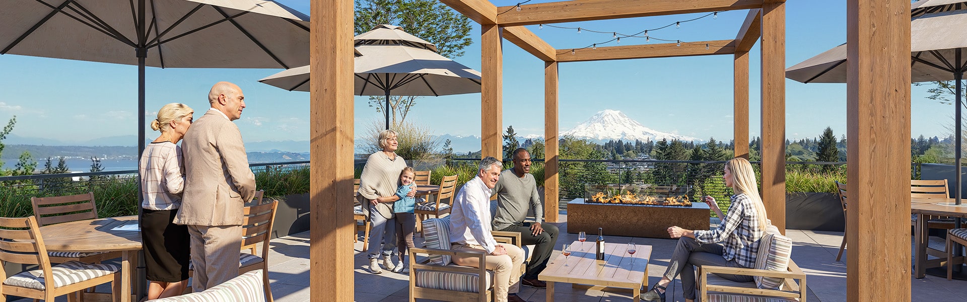 group of residents enjoying the rooftop decik