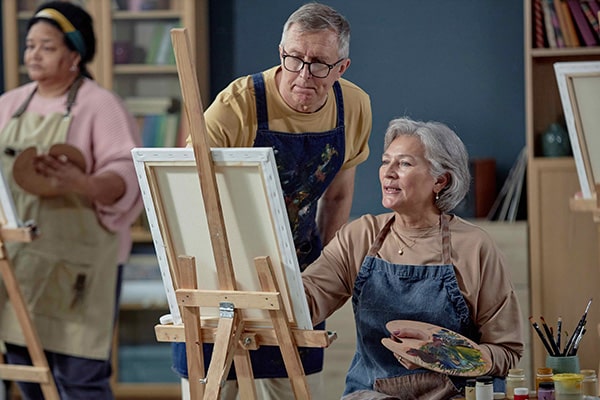 class of seniors painting