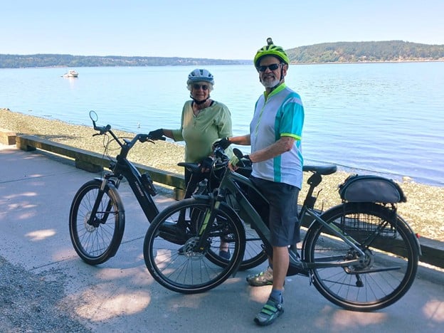 Franke Tobey Jones residents Eric and Donna Swenson bike the Point Defiance Park Owen Beach promenade.