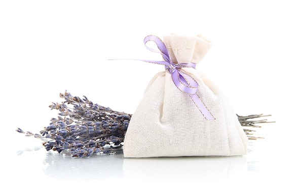 fresh lavender and a bag of lavender on a table